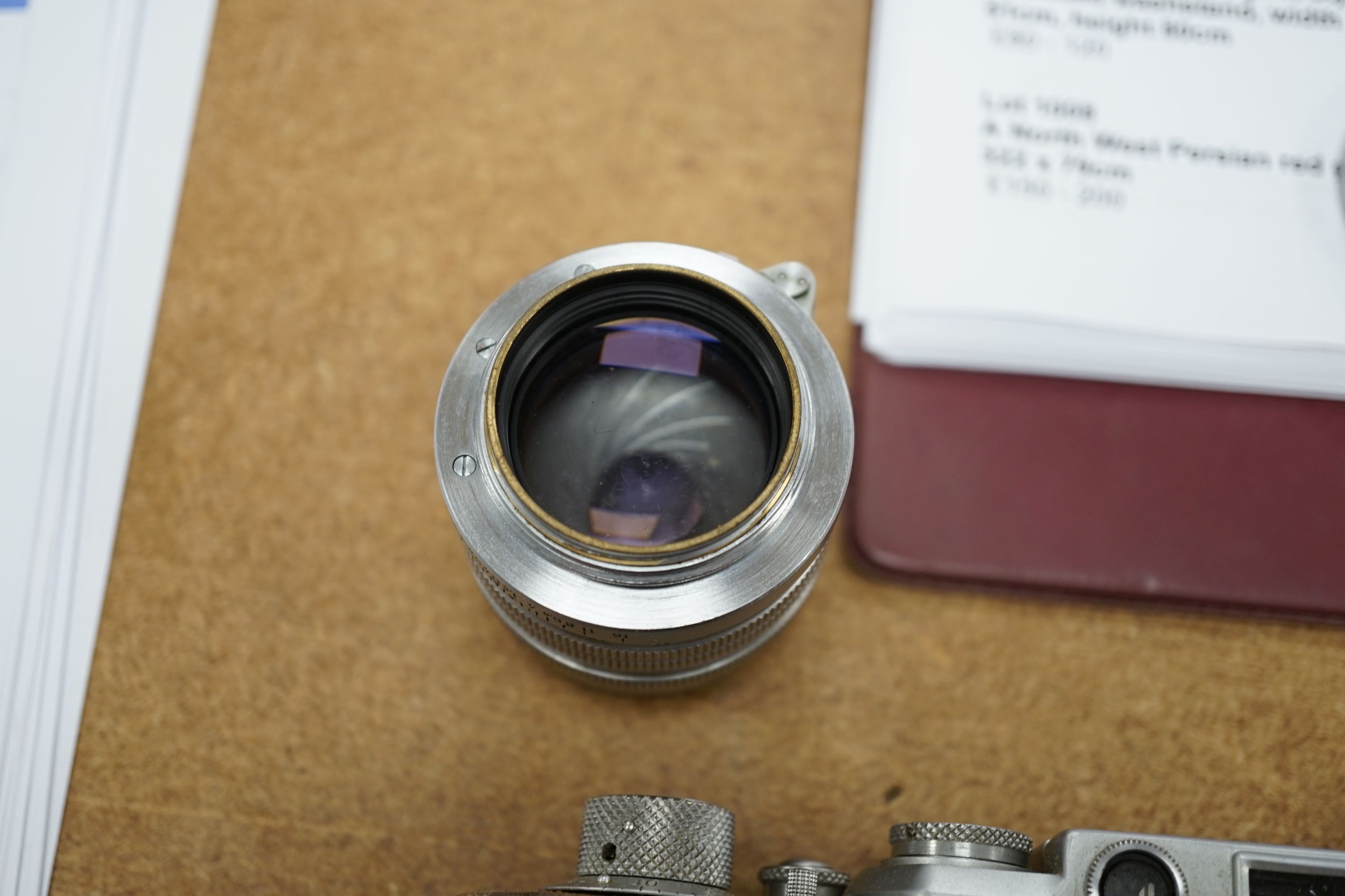 A cased Leica III camera serial number 767261 with Ernst Leitz GmbH Wetzlar Summarit f=5cm 1:15 No.135729 lens and light exposure meter